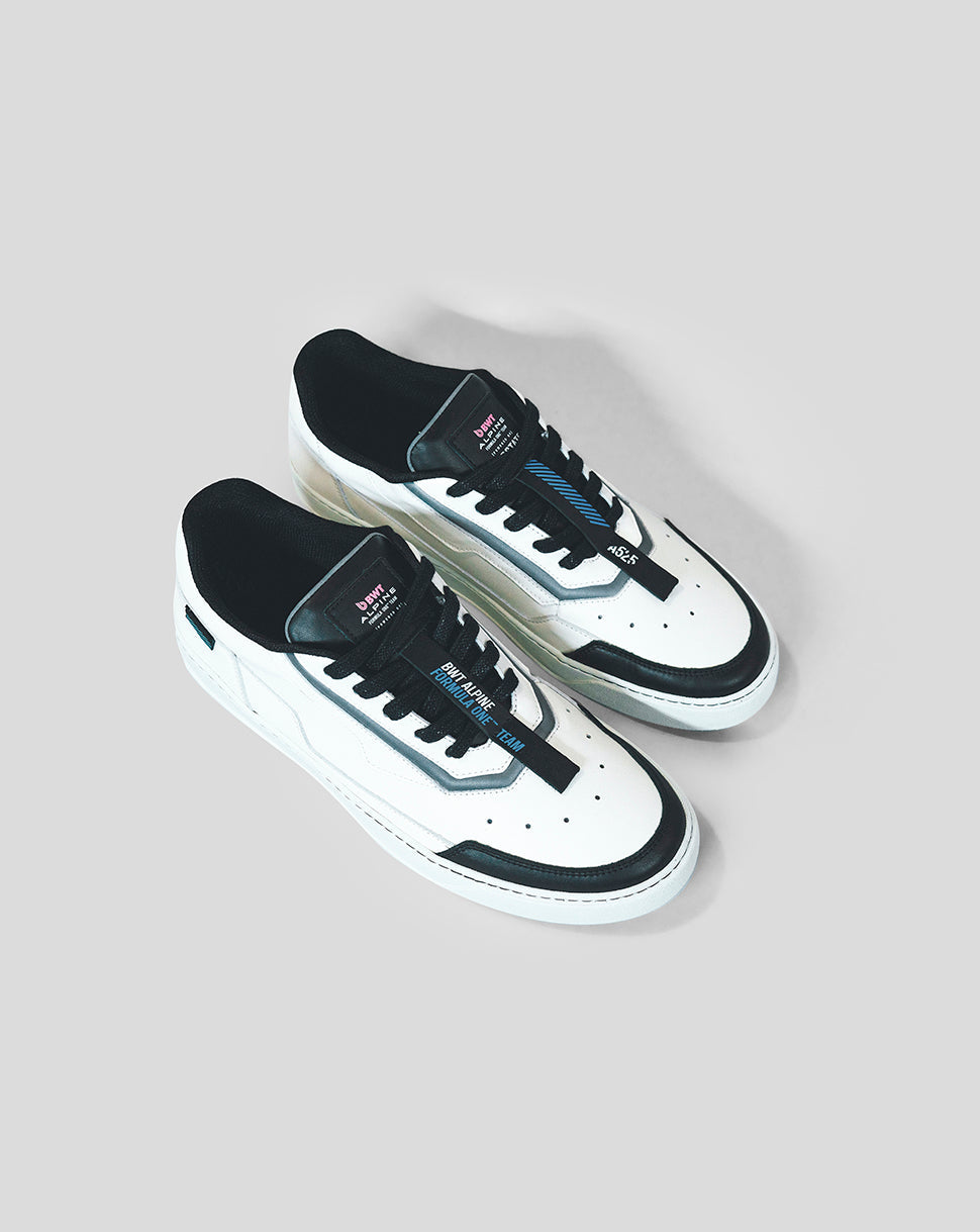 White Endstate sneaker with black detailing and laces shown from an overhead angle