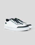 Pair of white BWT Alpine Endstate sneakers with black toe caps and metallic side stripe viewed from a three-quarter angle