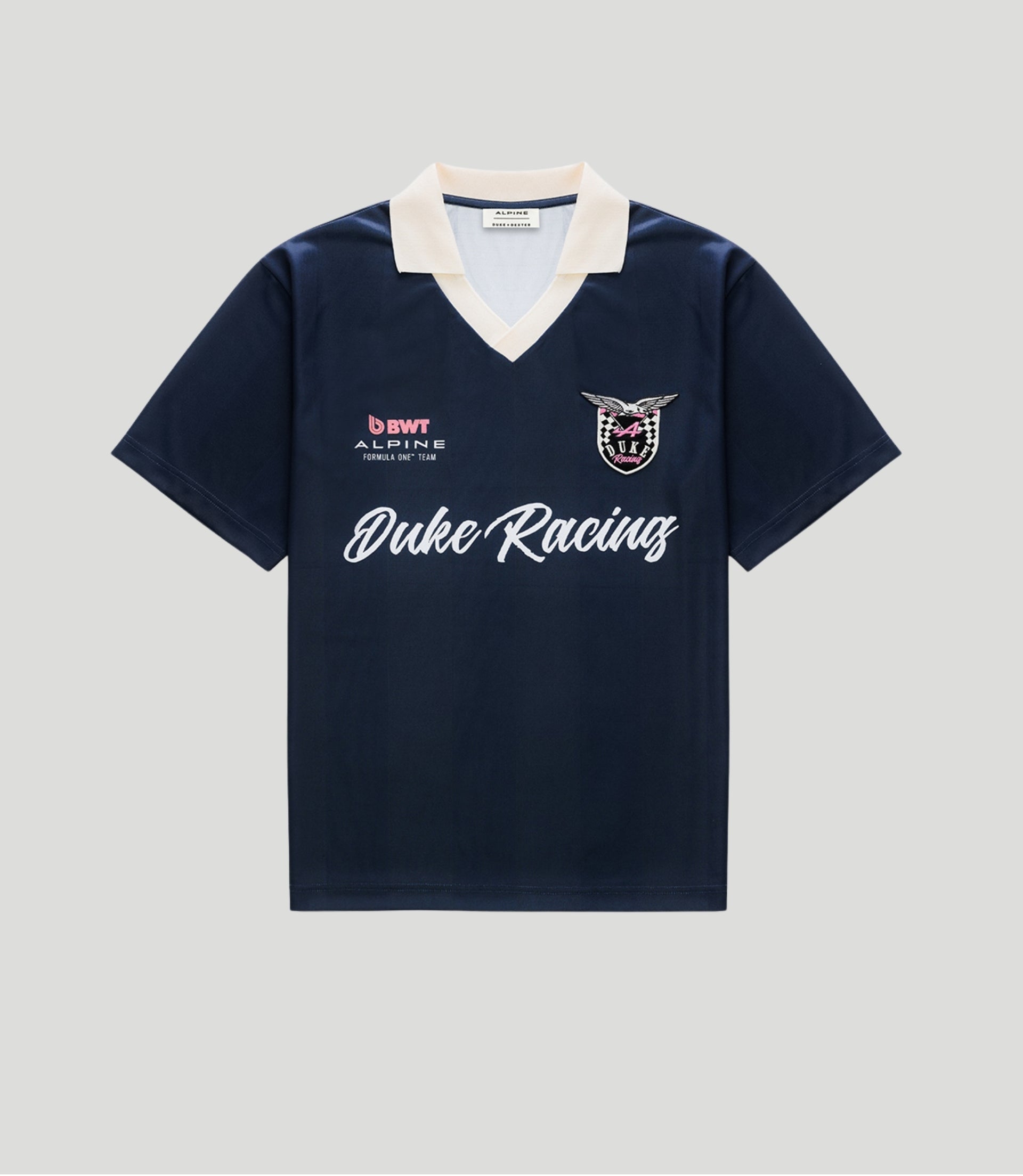 Navy polo jersey with cream collar and Duke Racing crest on the chest