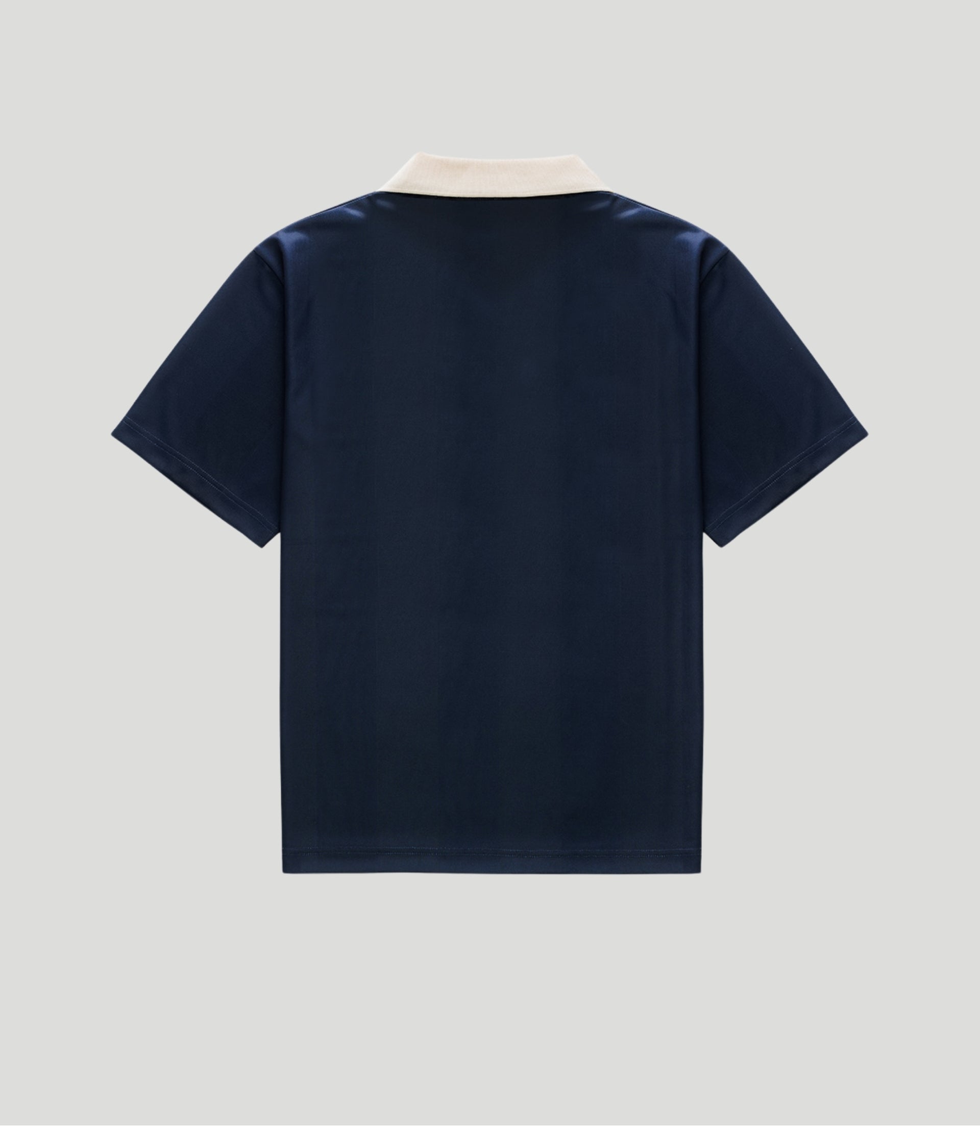 Back view of navy blue Duke & Dexter sports jersey with a cream collar
