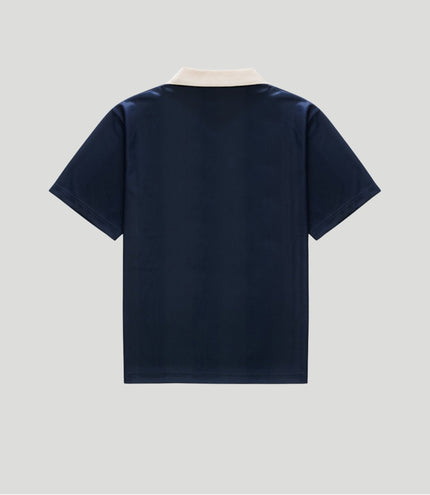 Back view of navy blue Duke & Dexter sports jersey with a cream collar