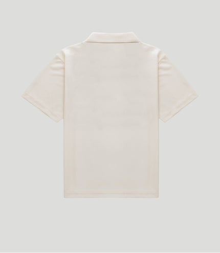 Back view of a cream Duke & Dexter sports jersey with collar and short sleeves