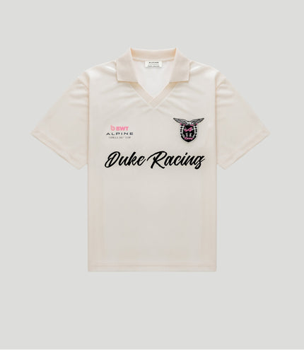 Gold BWT Alpine Formula One Team Duke Racing polo jersey with crest and sponsor logos.