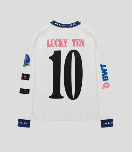 Back view of white Alpine jersey with pink LUCKY TEN and large black 10