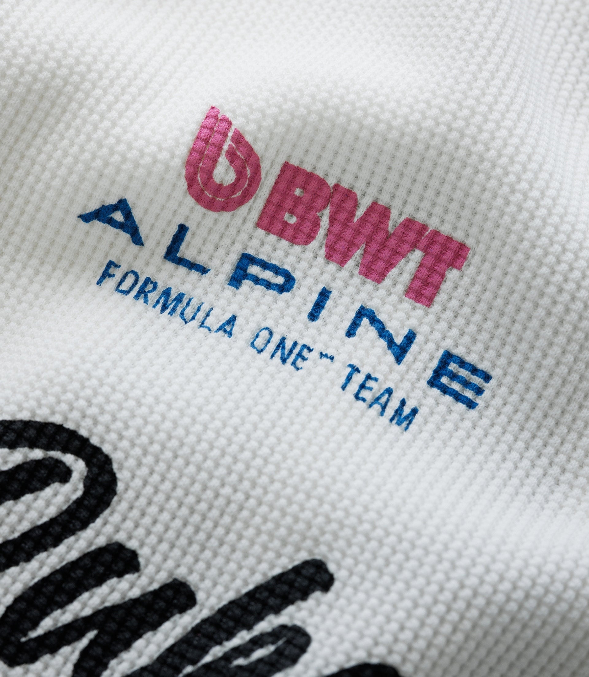 Pink BWT Alpine embroidery on white waffle fabric