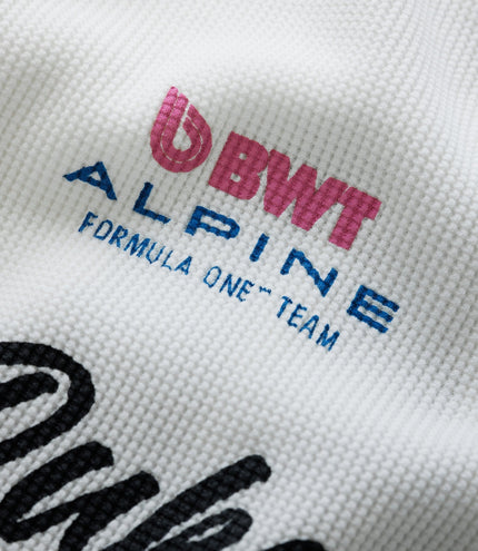 Pink BWT Alpine embroidery on white waffle fabric