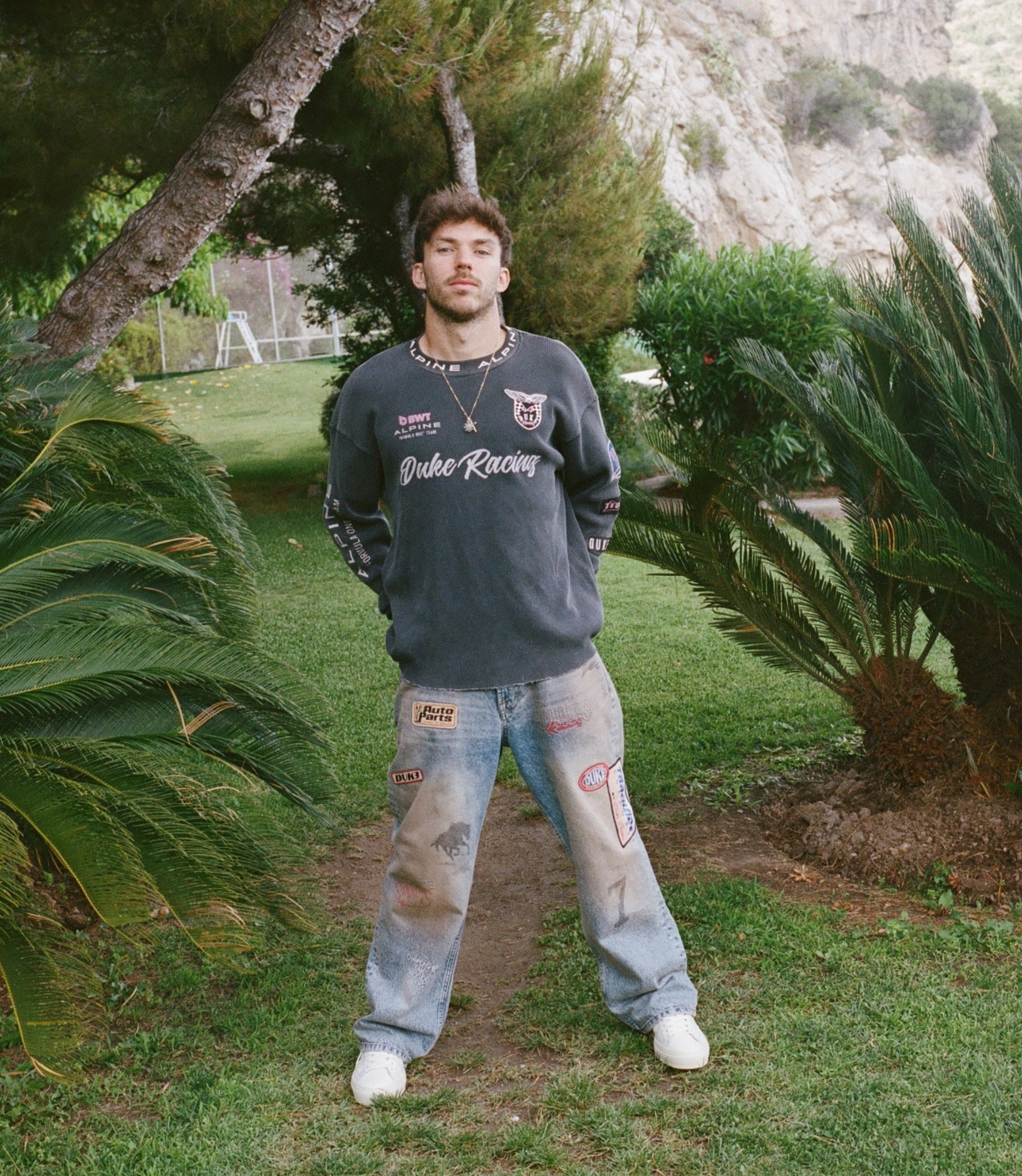 Man wearing the Unisex BWT Alpine Formula One Team x Duke & Dexter Washed Waffle Jersey in black outdoors